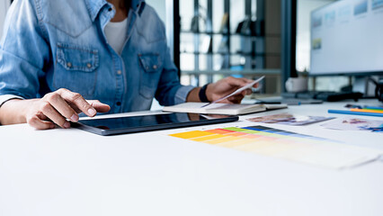 Fototapeta premium Advertising agency designer creative start-up team discussing ideas in office.