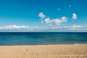 sand and sea and blue sky