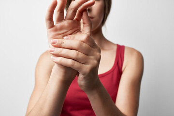 woman with joint pain in fingers arthritis rheumatism