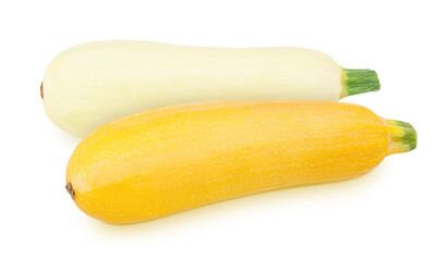 Vegetable composition with whole fresh zucchini isolated on a white background.