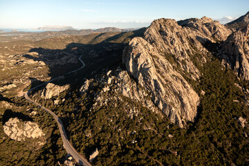 Aerial view of Balbacana rocks in San Pantaleo Sardinia with Tavolara island in the back