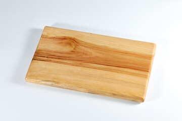 흰 배경 위의 나무 도마