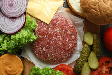 Concept of cooking burger with burger ingredients, closeup