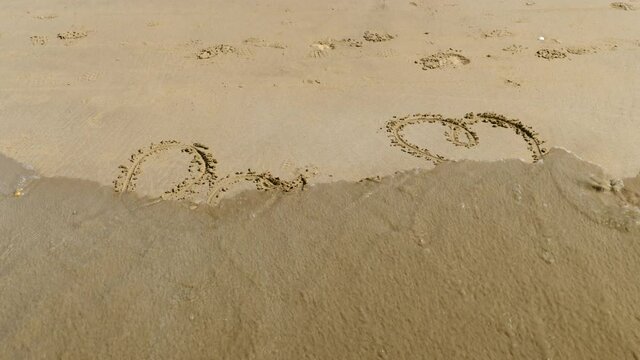 love message text on the beach