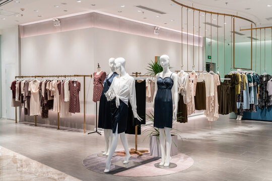modern fashion store with mannequins and woman clothes