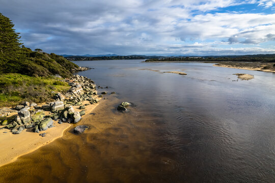 A cloud covered winters morning where the river meets the sea in Tuross Head
