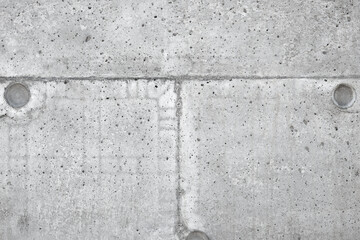 Wall texture at the junction of concrete slabs.