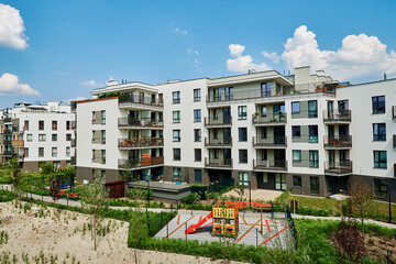 Modern residential complex. Facade of new house block in Europe. Complex of apartment residential buildings in Warsaw