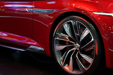 Modern style wheels in a red sports car.