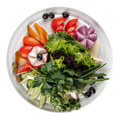 Isolated fresh vegetables platter with greens on white