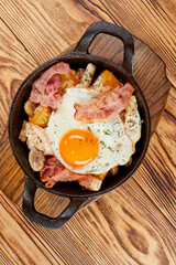 traditional breakfast with egg and sausage