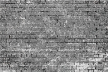 Old shabby brick wall as texture or background