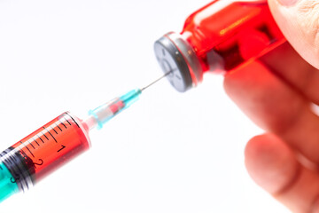 Vaccine in vial with syringe