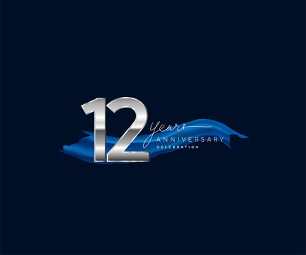 12th Years Anniversary celebration logotype silver colored with blue ribbon and isolated on dark blue background