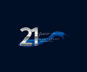 21st Years Anniversary celebration logotype silver colored with blue ribbon and isolated on dark blue background