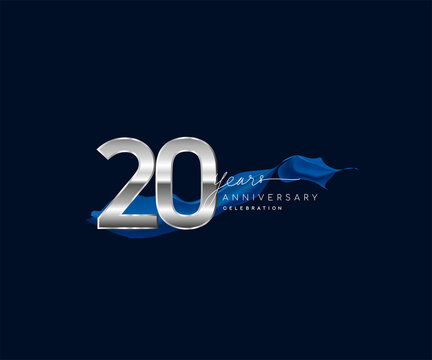 20th Years Anniversary celebration logotype silver colored with blue ribbon and isolated on dark blue background