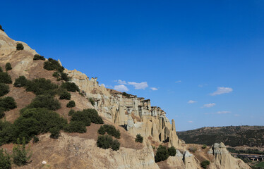 Fairy Chimneys, Kula Geopark at location Manisa, Turkey. Kula Volcanic Geopark, also known as Kuladoccia. It was recognized by UNESCO as a UNESCO Global Geopark and is the country's only geopark