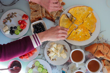 Breakfast table shot contains different types of foods. Turkish-Mediterrannean breakfast