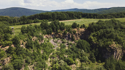 Fototapeta na wymiar Aerial view of the quarry under the castle of Somoska in Slovakia