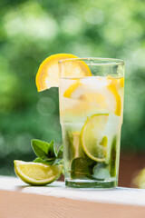 Lemonade with lemon, mint, lime, ice. Close-up. 