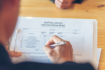 Job HR applicants having an interview with Human resource manager jobs interviewing with confident candidate at business firm office give cv resume. Job Interview with headhunter agent and applicant