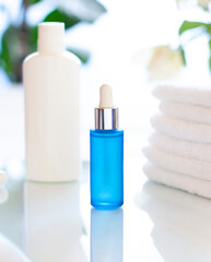 Cosmetic bottles in the bathroom close up. Concept beauty composition	