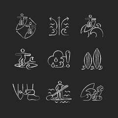 Water activities chalk white icons set on dark background. Surfing maneuvers. Keeping distance between surfers. Rip currents. Floater technique. Isolated vector chalkboard illustrations on black