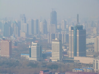 Low visibility in the city caused by severe air pollution in Jinan, China
