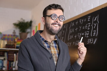 Math teacher with thick eyeglasses