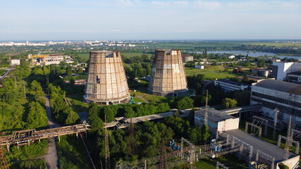 Aerial drone view flight near thermal power plant. Cooling towers of CHP