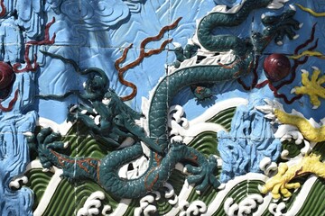 dragon, bas-relief on the wall
