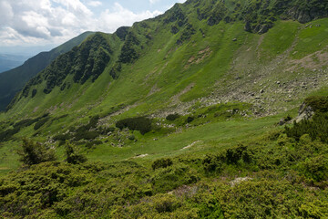 Beautiful landscape scene, steep slope of mountain with stones