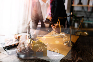 Woman lawyer explain the documents contact of insurance of fire and theft a house at office desk. home protection, family, insurance.rent house concept 