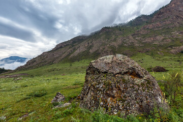 Fototapeta na wymiar Mountain landscape with cloudy sky. Ongudaysky district, Altai Republic