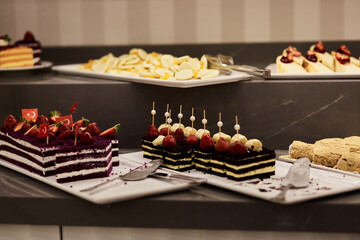 Turkish colorful desserts for picking up from buffet for hotel system of all-inclusive. Copy space