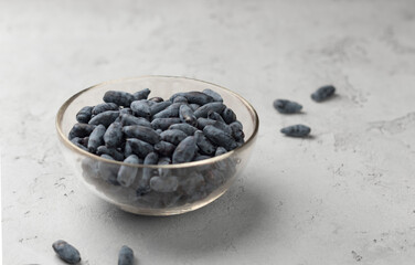 ripe honey suckle blueberries in a bowl