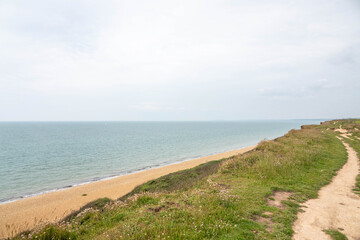 footpath overlooking a beautiful empty English beach
