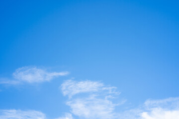 Naklejka na ściany i meble Abstract background with tiny cloud and blue sky.