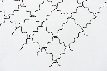 hand drawn lattice pattern background in black ink on white background 
