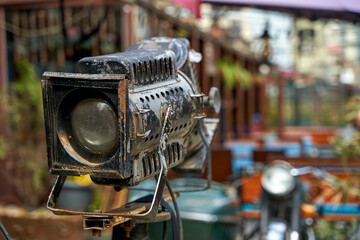 Fototapeta premium Street cafe exterior details. Vintage spotlight for lighting
