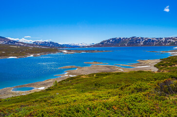 Amazing Vavatn lake panorama rough landscape boulders mountains Hemsedal Norway.