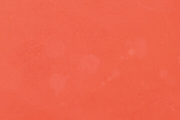 Background or wall surface decorated with dark pastel orange for design.