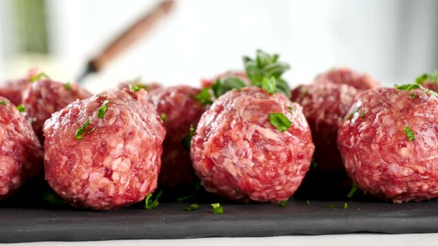 raw meatball and parsley