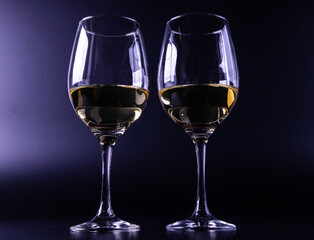 white wine glass with black background