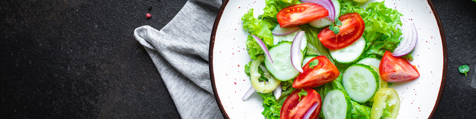 fresh salad organic vegetables tomato, cucumber, pepper, onion, lettuce meal snack copy space food background rustic. top view keto or paleo diet veggie vegan or vegetarian food