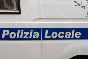 local police inscription on a car