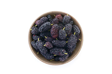 Isolated Mulberry berry in bowl.