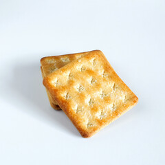 Sweet cracker cookies or biscuits on background, concept of food.