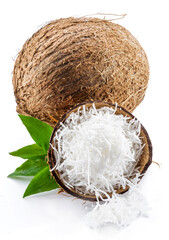 Coconut fruit and shredded coconut flesh isolated on white background.