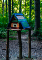 unusual birdhouse birdhouse in the park standing on three poles